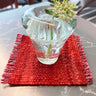 花瓶と赤のキリムコースターの写真